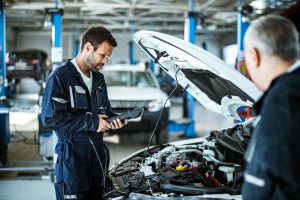 Mechanic working on car