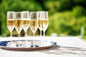 champagne flutes on a tray